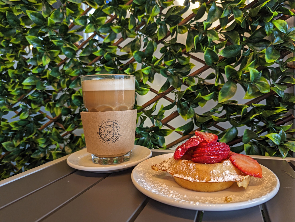 Starving Latte & strawberry waffles at Artist Waffles & Espresso