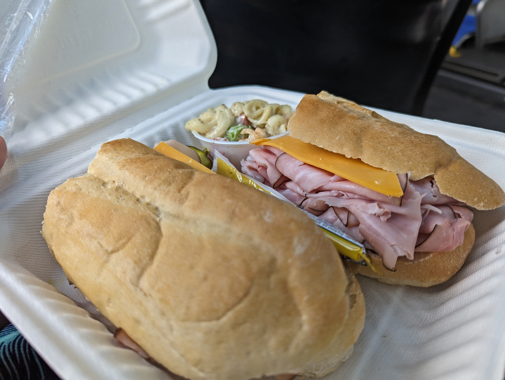 take out sandwich and pasta salad from Cara's Famous Deli