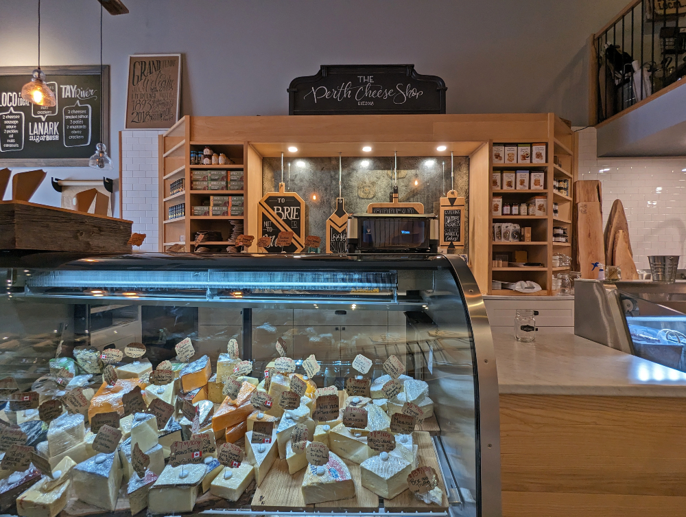 A great stop on the Sip and Savour Trail in Lanark County is the Perth Cheese Shop counter